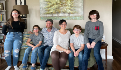 Jeffrey Smart and his wife Christine sit with their children Morgan, Hyett, TJ, and Noah. Photo courtesy of Jeffrey Smart.